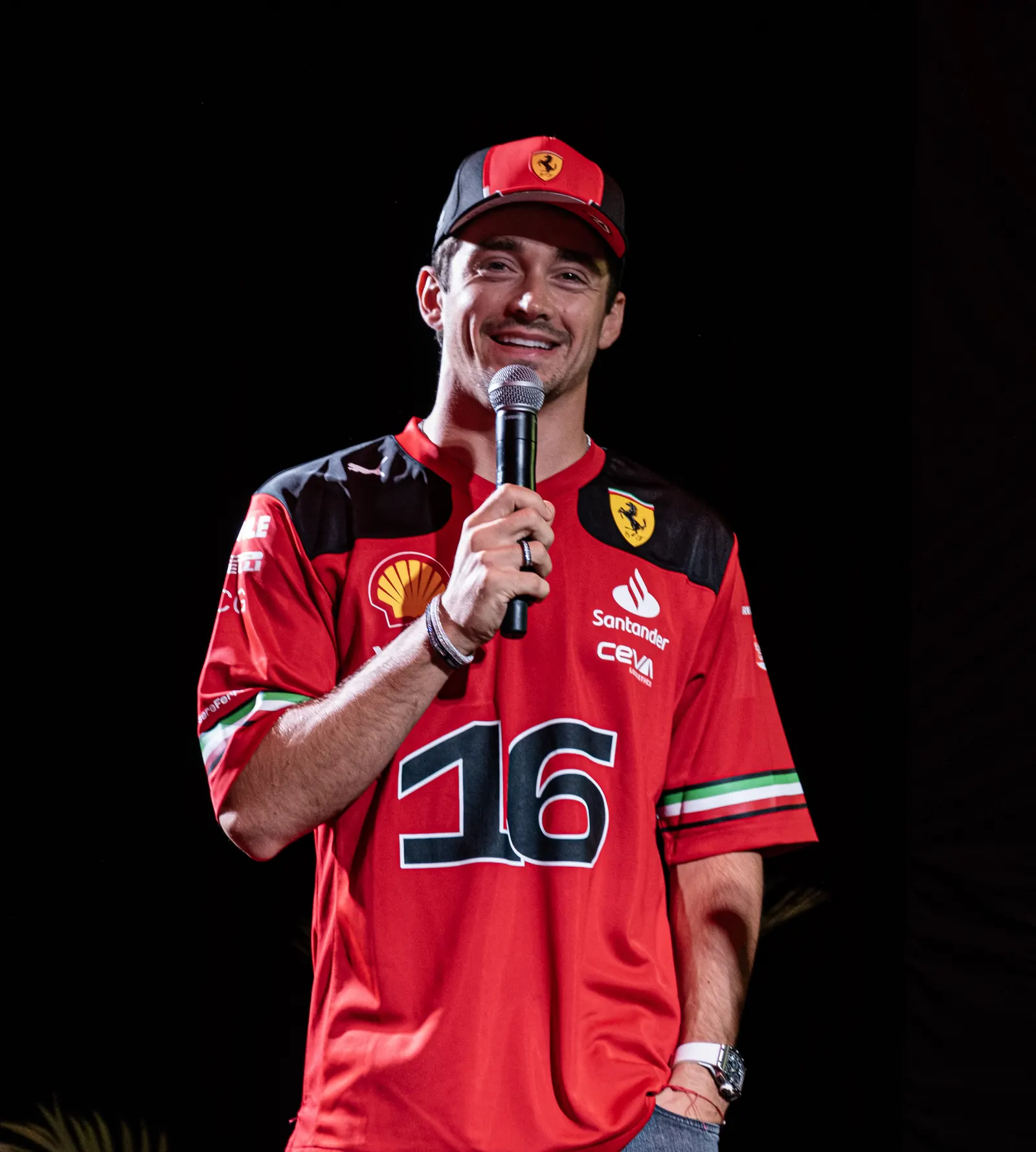 Scuderia Ferrari Formula 1 driver Charles Leclerc speaking on stage at the SF90 XX Stradale reveal at Ferrari of Austin
