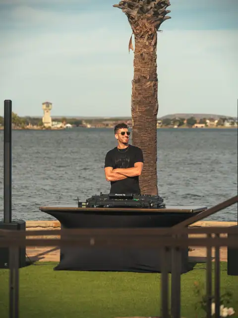 Jordan Miller DJing a Lamborghini Austin event on Lake Austin, 2024, photo 13