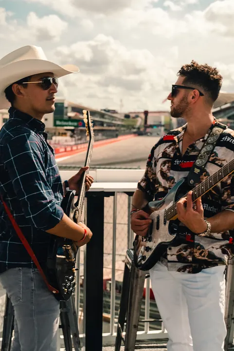 Jordan Miller with guitar at the US Grand Prix, Circuit of the Americas, 2023 (photo 4 of 16)