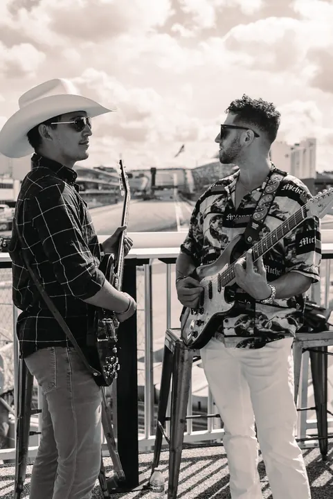 Jordan Miller with guitar at the US Grand Prix, Circuit of the Americas, 2023 (photo 5 of 16)