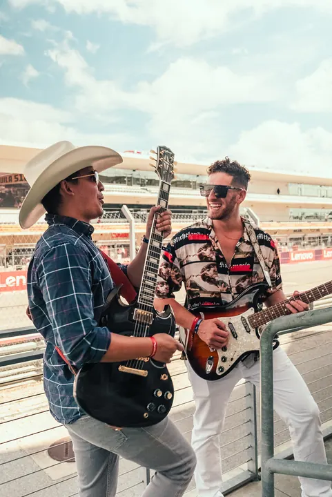 Jordan Miller with guitar at the US Grand Prix, Circuit of the Americas, 2023 (photo 10 of 16)